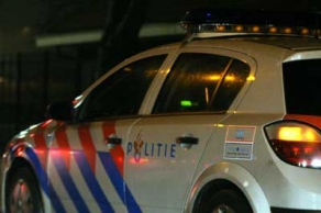 Foto van politieauto bij nacht | Archief FBF.nl