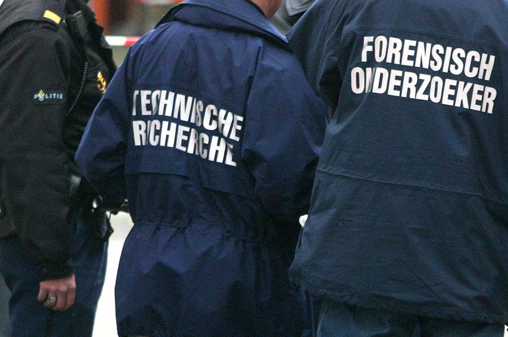 Foto van recherche van politie tijdens onderzoek | Archief EHF