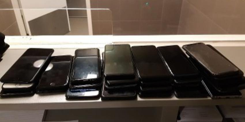 verdachte, aangehouden, wielrenbroek, 30 telefoons