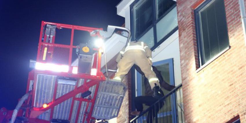 Vier personen gered bij middelbrand woning Schiedam 