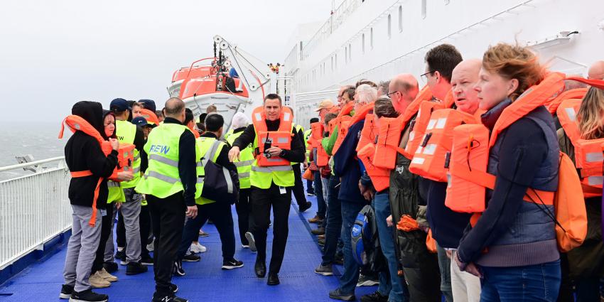 Evacués op dek Ferry