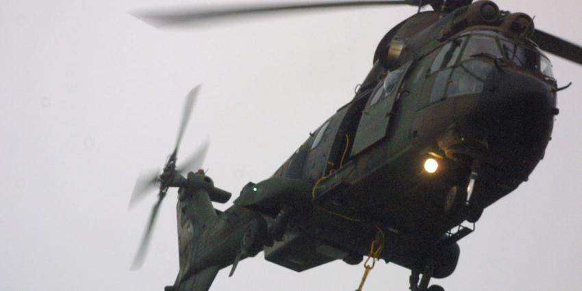 Lichaam piloot die op grote hoogte uit helikopter viel gevonden