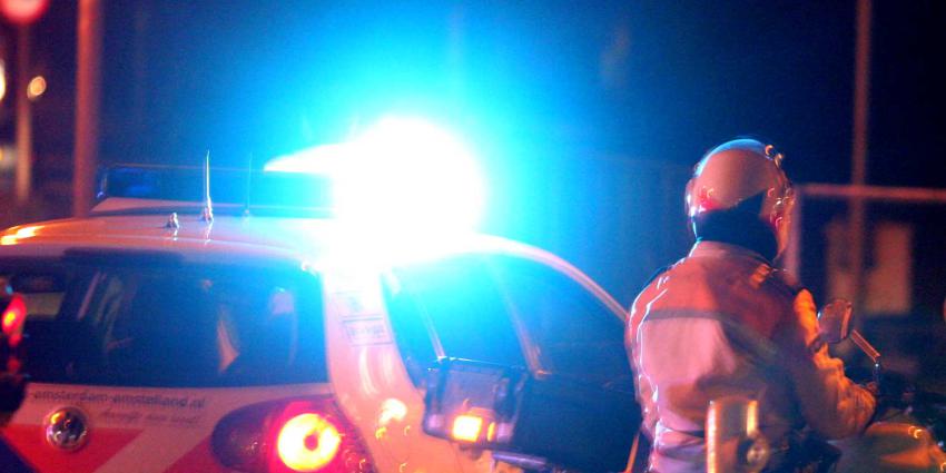 politieauto-motoragent-zwaailicht