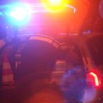 agent-donker-auto-zwaailicht