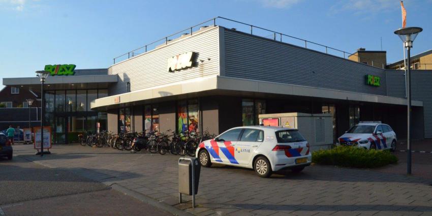 Politie bij supermarkt