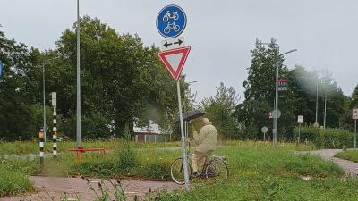 paraplu-fietser-herfst-regen