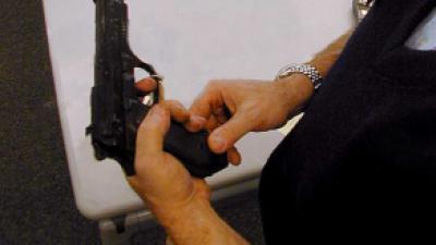 Foto van man met geweer | Archief FBF.nl