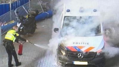 Politiebus in brand