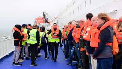 Evacués op dek Ferry