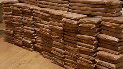 Colombianen in Amsterdam gepakt met 80 kilo cocaïne in woning