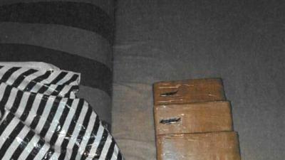 Vondst pakketjes op balkon leidt tot 17,5 kilo cocaïne en vuurwapen 