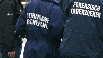 Foto van recherche van politie tijdens onderzoek | Archief EHF