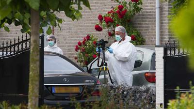 Foto van schietpartij auto woning Veghel | Sander van Gils | www.persburosandervangils.nl