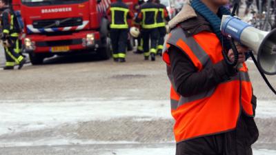 Foto van BHV'er met megafoon | Rick Akkerman