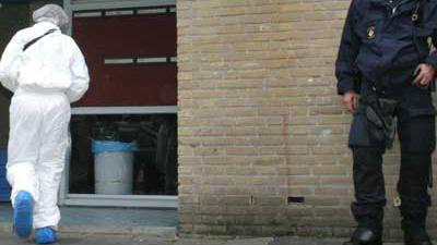 Foto van forensisch onderzoek in flat | Archief EHF