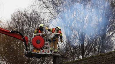 schoorsteen-brand-brandweer-hoogwerker